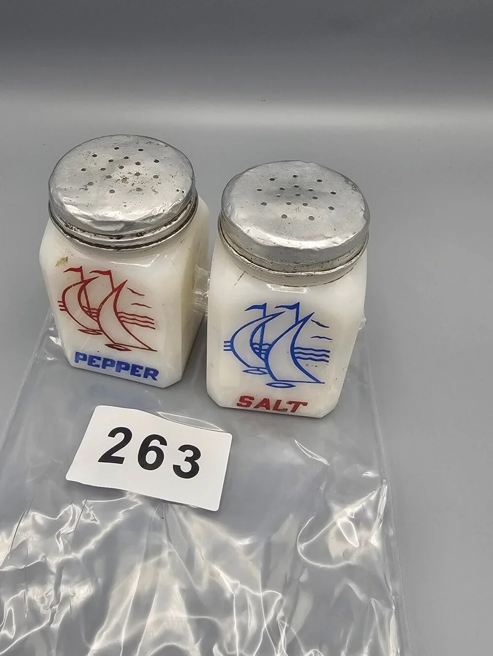 Vintage Milk Glass Salt and Pepper Shakers with Sailboat Design